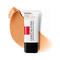 A tube of La Roche-Posay Toleriane foundation stands next to a swatch of beige foundation on a white background.