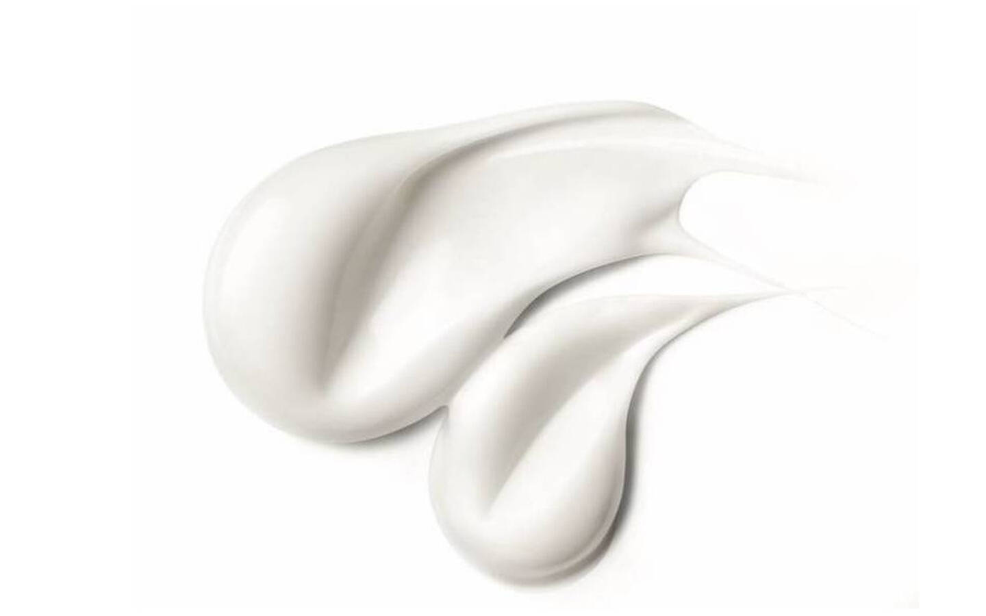 Un fond blanc avec des ondulations de creme blanche, creant une texture douce et fluide.