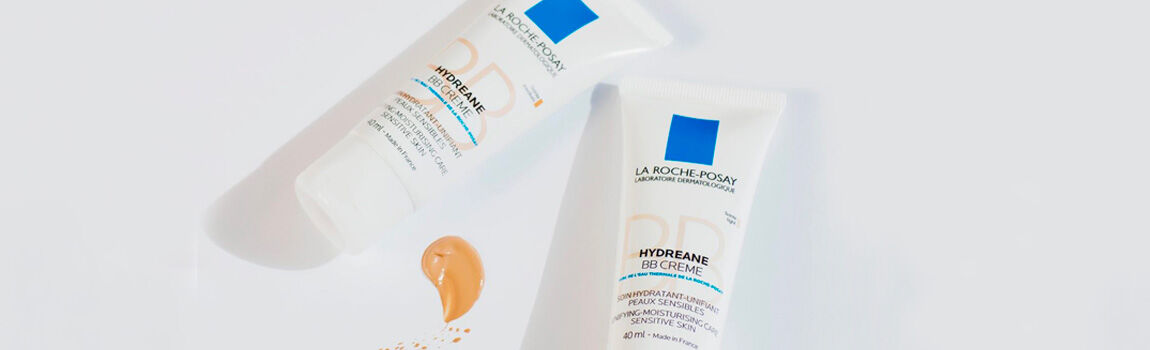 Two tubes of La Roche-Posay Hydreane BB Creme are displayed on a light background, with a small amount of the product spilled out beside them.