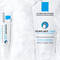 Two skincare tubes from La Roche-Posay sit on a snowy background. The products are labeled "Cicaplast Lips" and "Cicaplast Hands," highlighting their use for moisturizing and repairing.