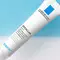A tube of La Roche-Posay Effaclar skincare product against a blue and white background.