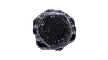 A circular illustration featuring turquoise and green swirling patterns resembling a planet.