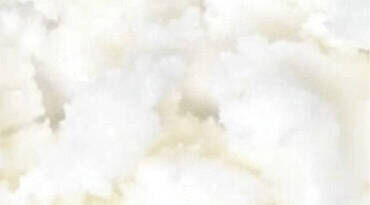 Un fond flou de texture blanche, evoquant de la creme ou de la mousse.