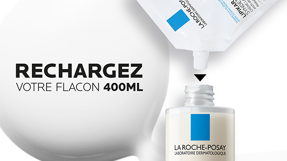 Recharge de flacon de crème La Roche-Posay 400ml avec une goutte qui tombe de l'emballage.